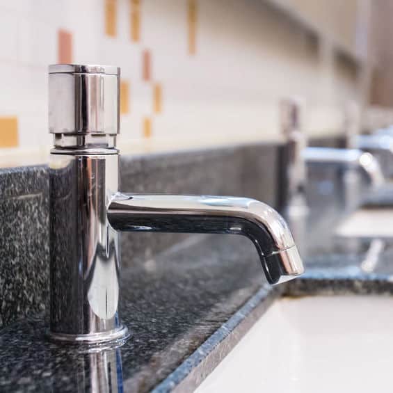 commercial sink faucets in a row