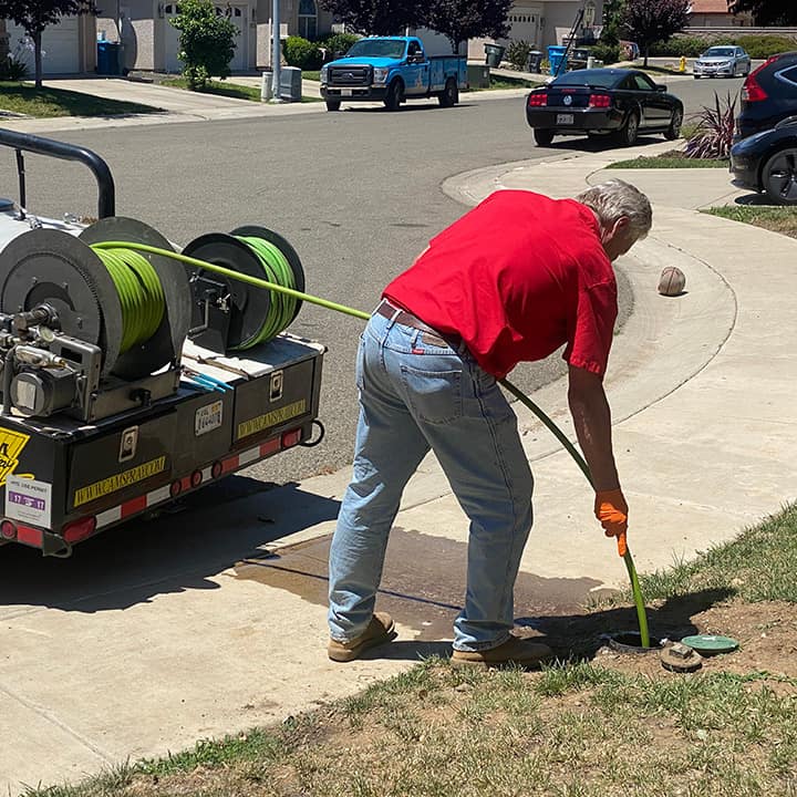 Plumber spray jetting drain