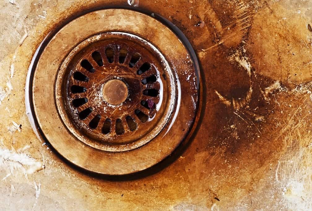 old dirty metal corroded rusty sink drain