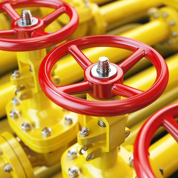 large yellow gas lines with red valves